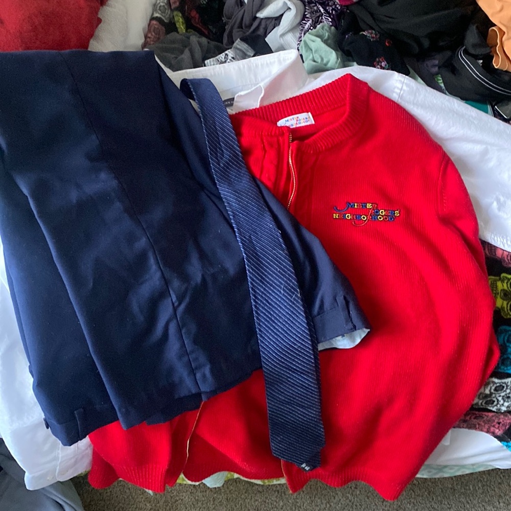 Full Mr rogers costume.  Fits large/xlg.   Tie, slacks, shirt and sweater.